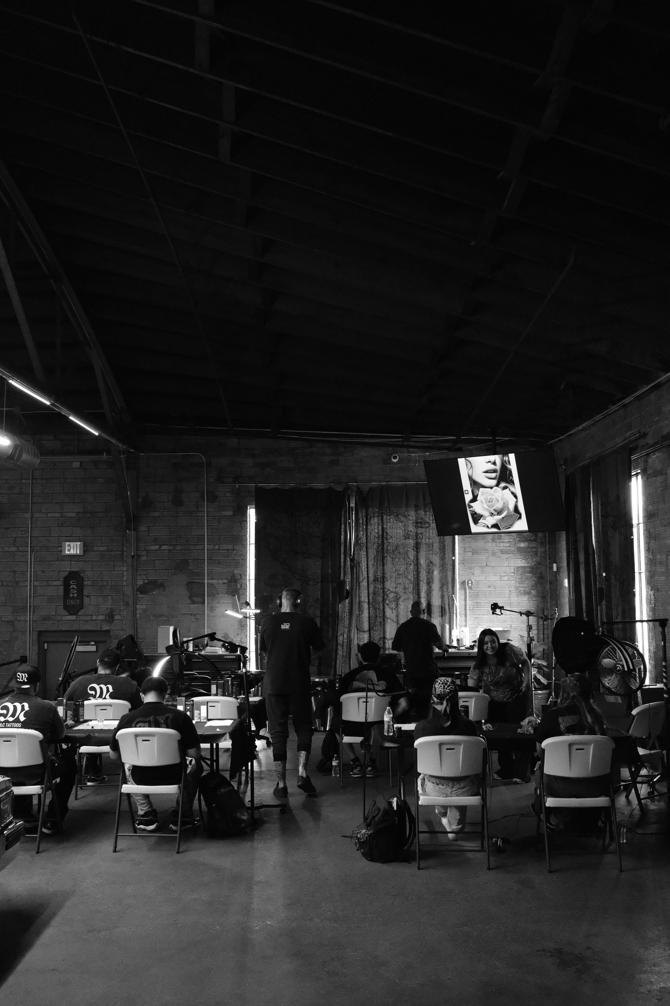 Mitchell demonstrating machine setup to an attending artist